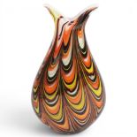 A mid-century Murano style glass vase, with multi coloured pulled glass design, height 20cm Good