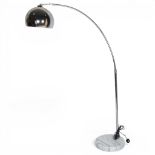 A contemporary chrome and marble arc floor lamp, with circular white marble base and adjustable