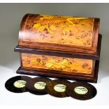 A Thorens Swiss Walnut and Marquetry Music Box, with a windup movement, dome topped and on plinth