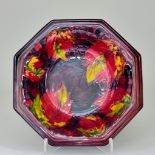 A William Moorcroft Pottery Flambe Octagonal Dish, tube lined in Leaf & Berry pattern 10.25ins wide,