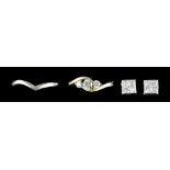An 18ct White Gold Diamond Set Suite, comprising - an 18ct white gold three stone diamond ring,