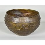 An Eastern Bronzed Metal Jardinière, Late 19th Century/Early 20th Century, with repoussé design of
