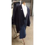 APPROX 22 DARK BLUE TAILCOATS, SIZES 36-48, APPROX 22 BLUE PIN STRIPED TROUSERS, SIZES 28-46 AND