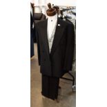 APPROX 33 BLACK DOUBLE-BREASTED JACKETS, SIZES 36-46, APPROX 33 BLACK TROUSERS, SIZES 28-40 AND