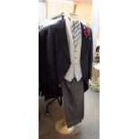 APPROX 30 BLACK TAILCOATS, SIZES 32-48, APPROX 30 GREY PIN STRIPED TROUSERS, SIZES 30-48 AND