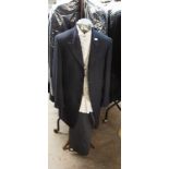APPROX 30 BLUE TAILCOATS, SIZES 34-50, APPROX 30 BLUE PIN STRIPED TROUSERS, SIZES 32-50 AND APPROX
