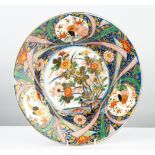 JAPANESE LATE MEIJI PERIOD IMARI PORCELAIN WALL PLAQUE, painted in colours and gilt with panels