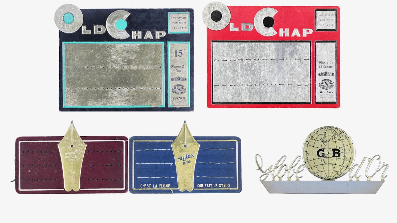 Six French fountain pen displays and advertisements, with another, early/mid 20th century (7)