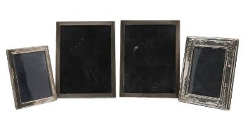 Four silver mounted photograph frames