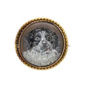 A late Victorian Essex rock crystal brooch of a spaniel