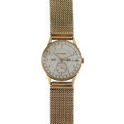 An 18ct gold Movado Calendograf manual wind wristwatch