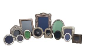 A group of thirteen silver and plated photograph frames