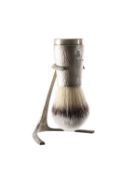 A Christopher Nigel Lawrence silver shaving brush and stand