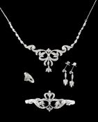 A decorative suite of diamond set jewellery