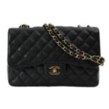 A Chanel 'Jumbo Classic' double flap black caviar bag
