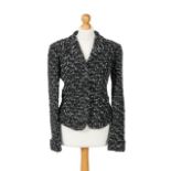 A Chanel black tweed blazer