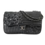 A Chanel 'Paris-Dallas' black lambskin flap bag