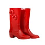A pair of Chanel red wellington boots
