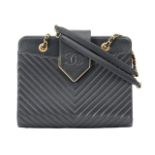 A Chanel 'Boy' navy leather shoulder bag