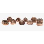 A group of nine Victorian copper jelly moulds