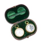 A Negretti and Zambra travelling aneroid barometer and compass set