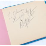 An autograph book signed by Roger Moore, Sean Connery, Michael Caine, Robert and Natalie Wood Wagner
