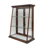 A walnut shop display cabinet