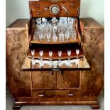 WALNUT COCKTAIL CABINET CONTAINING GLASSWARE, CABINET APPROX 136cm LENGTH, 125cm HIGH AND 40cm