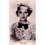 Merle Oberon signed black and white photo postcard.