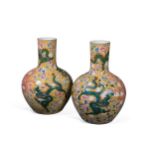 A pair of Chinese large yellow ground bottle vases,