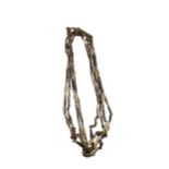 A long guard chain, stamped '12K', weight 20.9g