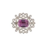 An early 20th century pink topaz and diamond brooch,