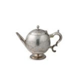 A George I silver teapot,