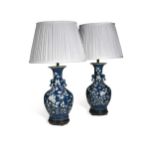 A pair of Chinese blue ground and slip decorated vases, early 20th century,