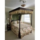 A mahogany four poster bed by Heal & Son, London,
