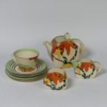 A Clarice Cliff 'Honolulu' pattern Teapot, in the 'Bonjour' shape, early 20th Century, painted in
