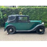 1936 Austin Ten Cabriolet, 1125cc, green with folding black roof, Registration no. CXF 559,