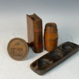 Antique Treen, including two biscuit moulds, a two-piece barrel, and a money box in the form of a