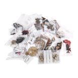 A collection of British military cap badges and related insignia,