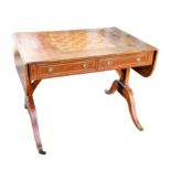 A Regency style mahogany sofa 'games' table, and contents including a chess set