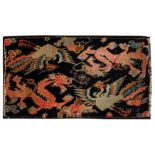 An antique Tibetan rug