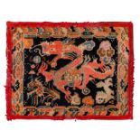 An antique Tibetan rug