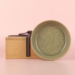 A fine Chinese Yaozhou celadon 'waves' carved dish, Northern Song dynasty 北宋 耀州青釉刻花小盤