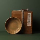 A rare Chinese Longquan Beishoku celadon lobed washer, Southern Song - Yuan dynasty 南宋至元 米黃釉菊瓣洗