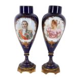 A pair of French Sèvres style cobalt blue porcelain portrait vases Late 19th century