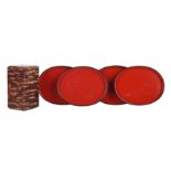 A Japanese cherry bark tea caddy and four lacquer trays, 20th/21st century
