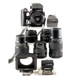 An Extensive Bronica ETRSi Medium Format Outfit. With six lenses from 40mm to 250mm.