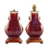 A pair of Chinese flambé-glazed 'hu' vases, late Qing dynasty 晚清 窰變釉貫耳瓶一對