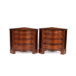A near pair of Sheraton period satinwood corner commodes