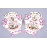 A pair of German porcelain wall pockets